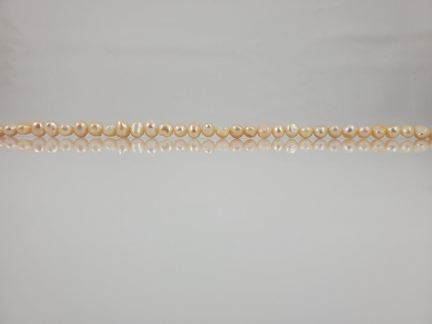 Natural White Freshwater Pearls Organic Flat Round and Oval