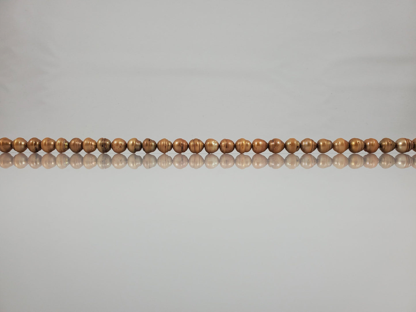 Natural Light Brown-Gold Freshwater Pearls Oblong Round