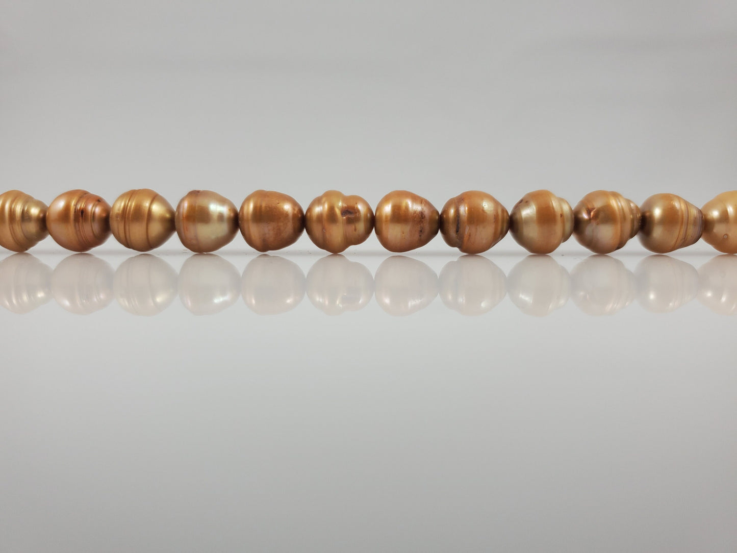 Natural Light Brown-Gold Freshwater Pearls Oblong Round